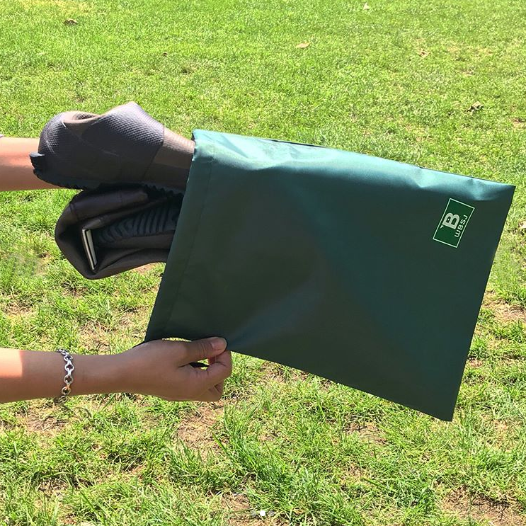 
                  
                    Folded boots with attached nylon bag
                  
                