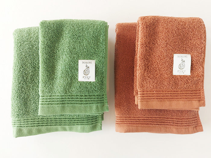 
                  
                    Natural Dye 'Nokorifuku' Hand Towel by Fukuroya Towel
                  
                