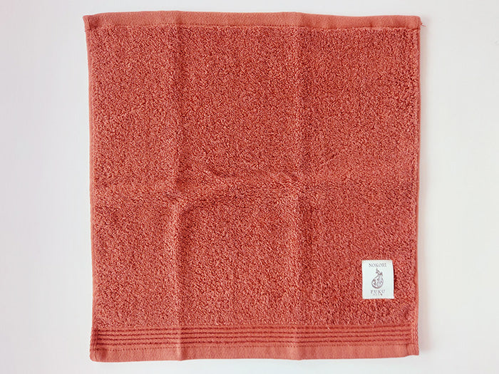 
                  
                    Natural Dye 'Nokorifuku' Hand Towel by Fukuroya Towel
                  
                