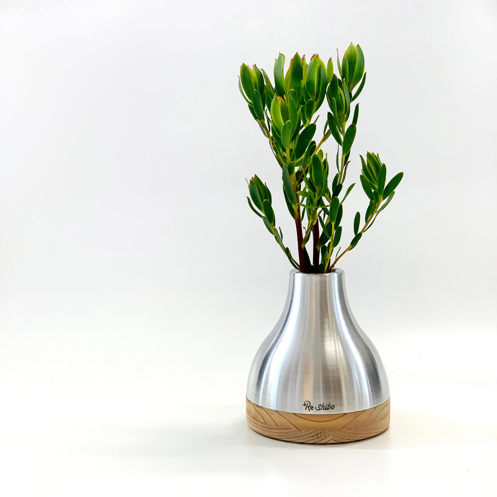 
                  
                    Re-Shibo Aluminium and Wood Vase by Sano Design
                  
                