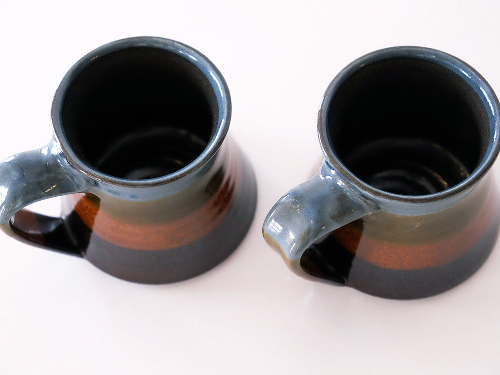
                  
                    Coffee Mug by Giran Sagawa
                  
                