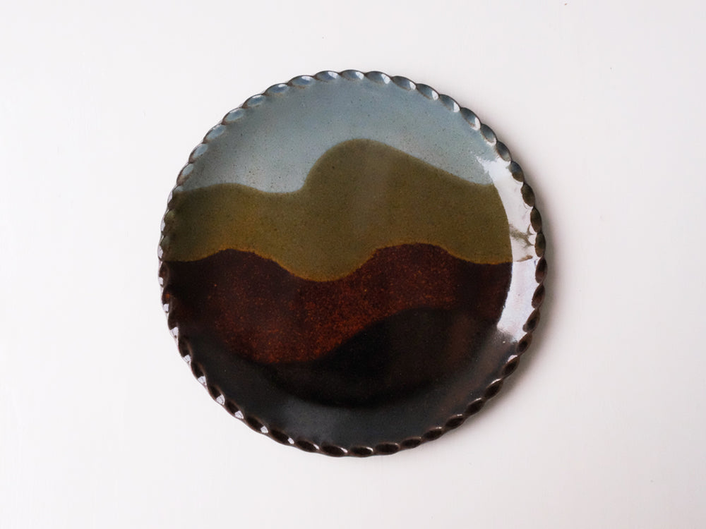 
                  
                    Earth Coloured Round Plate by Giran Sagawa
                  
                