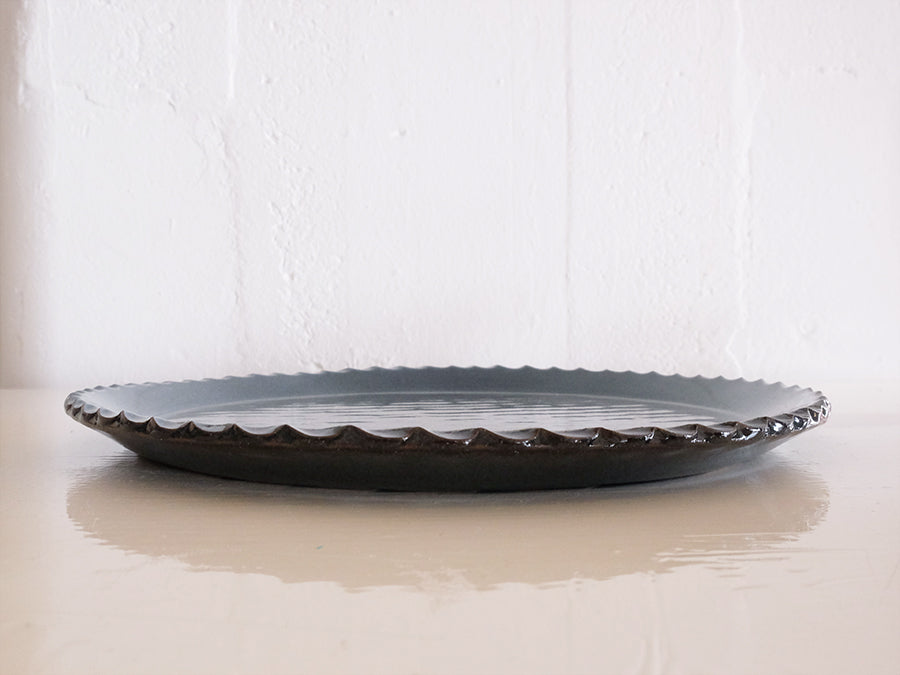 
                  
                    Round Plate by Giran Sagawa
                  
                