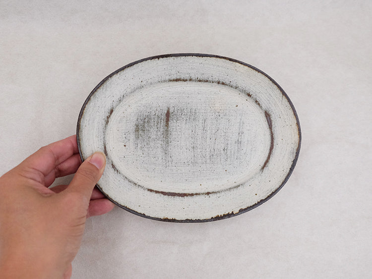 
                  
                    Scratch Oval Plate by Takahiro Manome
                  
                